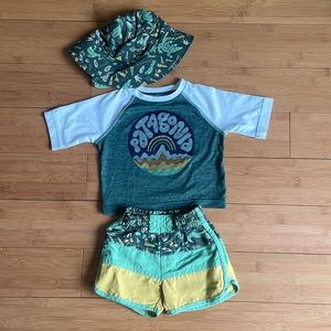 Patagonia baby swim trunks, sun shirt and sun hat. Excellent condition 3-6M